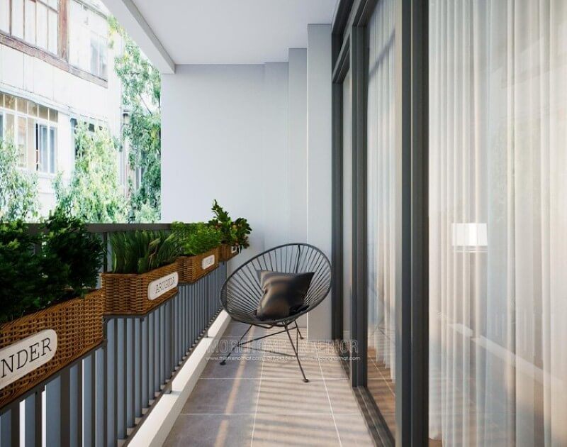 Mẫu bố trí ban công xanh với giàn giỏ trồng độc đáo.