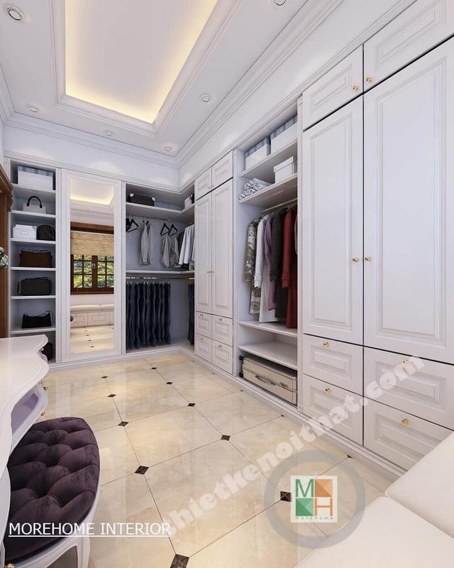 Mẫu tủ quần áo gỗ màu trắng với thiết kế kịch trần tạo cảm giác thông thoáng, cao cấp cho căn phòng